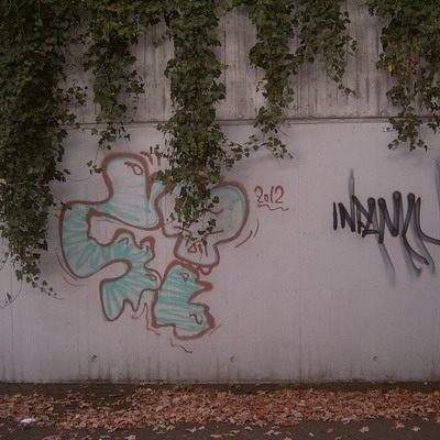 Graffiti and street art from a photo tour in Bremen including colourful sprayed tags and top-to-bottoms.