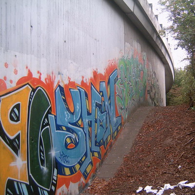 Graffiti and street art from a photo tour in Bremen including colourful sprayed tags and top-to-bottoms.