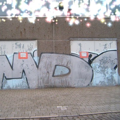 Graffiti and street art from a photo tour in Bremen including colourful sprayed tags and top-to-bottoms.