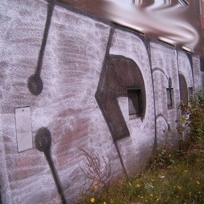 Graffiti and street art from a photo tour in Bremen including colourful sprayed tags and top-to-bottoms.