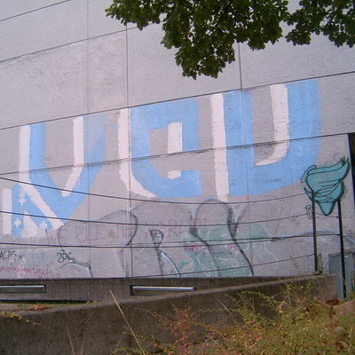Graffiti and street art from a photo tour in Bremen including colourful sprayed tags and top-to-bottoms.