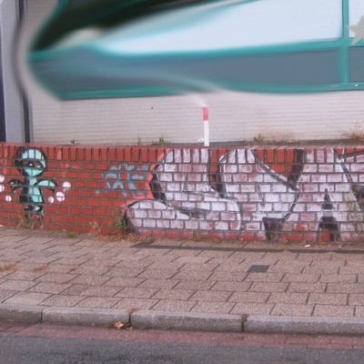 Graffiti and street art from a photo tour in Bremen including colourful sprayed tags and top-to-bottoms.