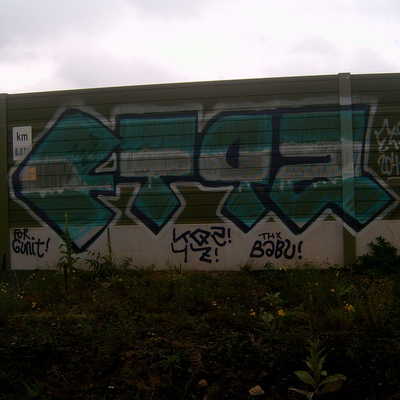Graffiti and street art from a photo tour in Bremen including colourful sprayed tags and top-to-bottoms.