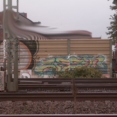 Graffiti and street art from a photo tour in Bremen including colourful sprayed tags and top-to-bottoms.