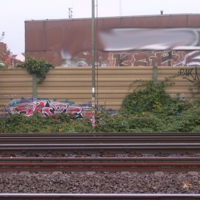 Graffiti and street art from a photo tour in Bremen including colourful sprayed tags and top-to-bottoms.