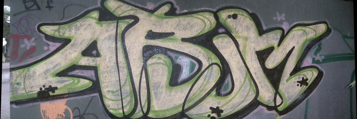 Graffiti and street art from a photo tour in Bremen including colourful sprayed tags and top-to-bottoms.