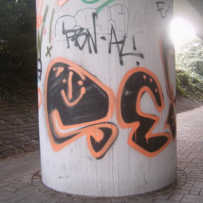 Graffiti and street art from a photo tour in Bremen including colourful sprayed tags and top-to-bottoms.
