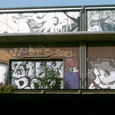 Graffiti and street art from a photo tour in Bremen including colourful sprayed tags and top-to-bottoms.