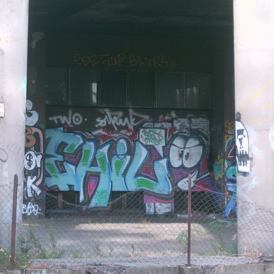 Graffiti and street art from a photo tour in Bremen including colourful sprayed tags and top-to-bottoms.