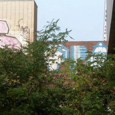 Graffiti and street art from a photo tour in Bremen including colourful sprayed tags and top-to-bottoms.