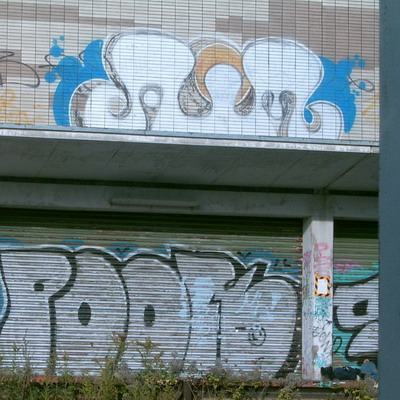 Graffiti and street art from a photo tour in Bremen including colourful sprayed tags and top-to-bottoms.