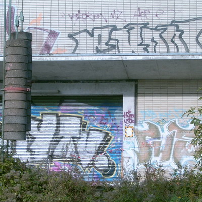 Graffiti and street art from a photo tour in Bremen including colourful sprayed tags and top-to-bottoms.