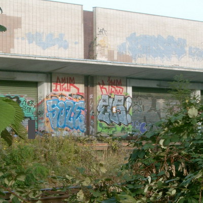 Graffiti and street art from a photo tour in Bremen including colourful sprayed tags and top-to-bottoms.