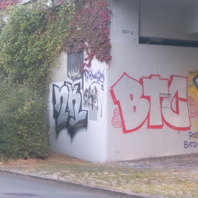 Graffiti and street art from a photo tour in Bremen including colourful sprayed tags and top-to-bottoms.