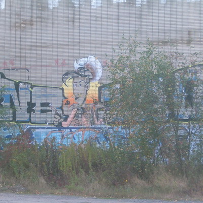 Graffiti and street art from a photo tour in Bremen including colourful sprayed tags and top-to-bottoms.