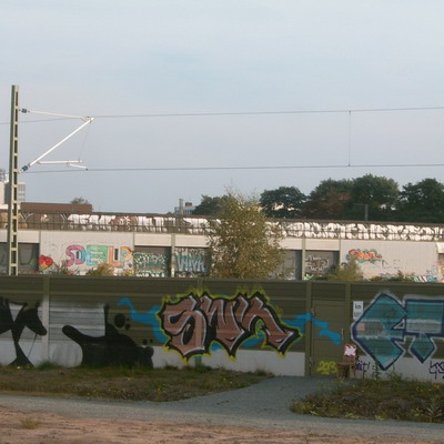 Graffiti and street art from a photo tour in Bremen including colourful sprayed tags and top-to-bottoms.